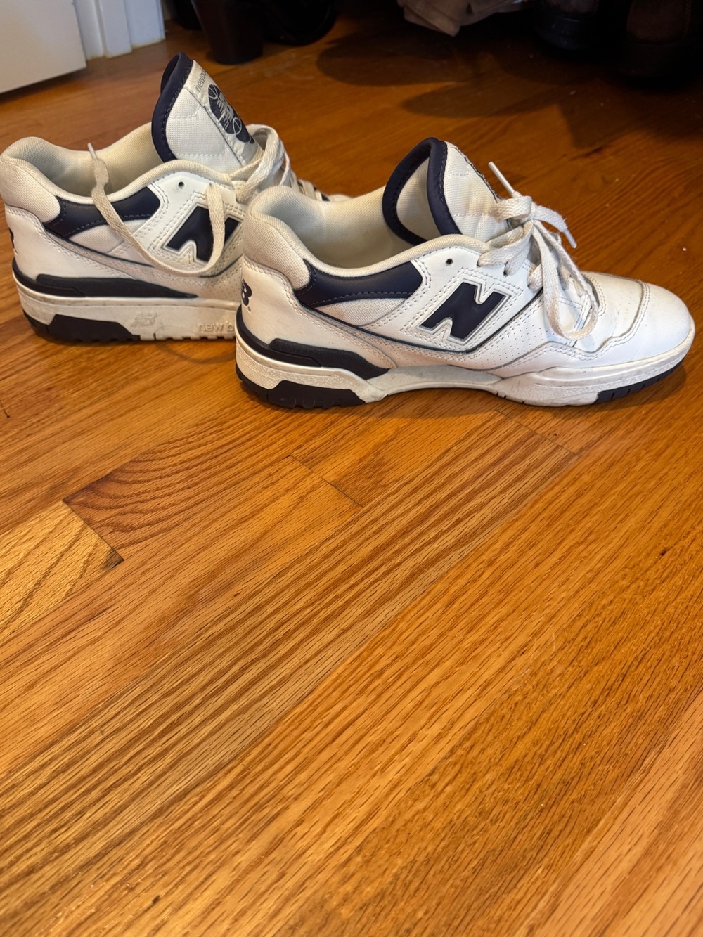 New Balance White and Navy Low-Top Sneakers